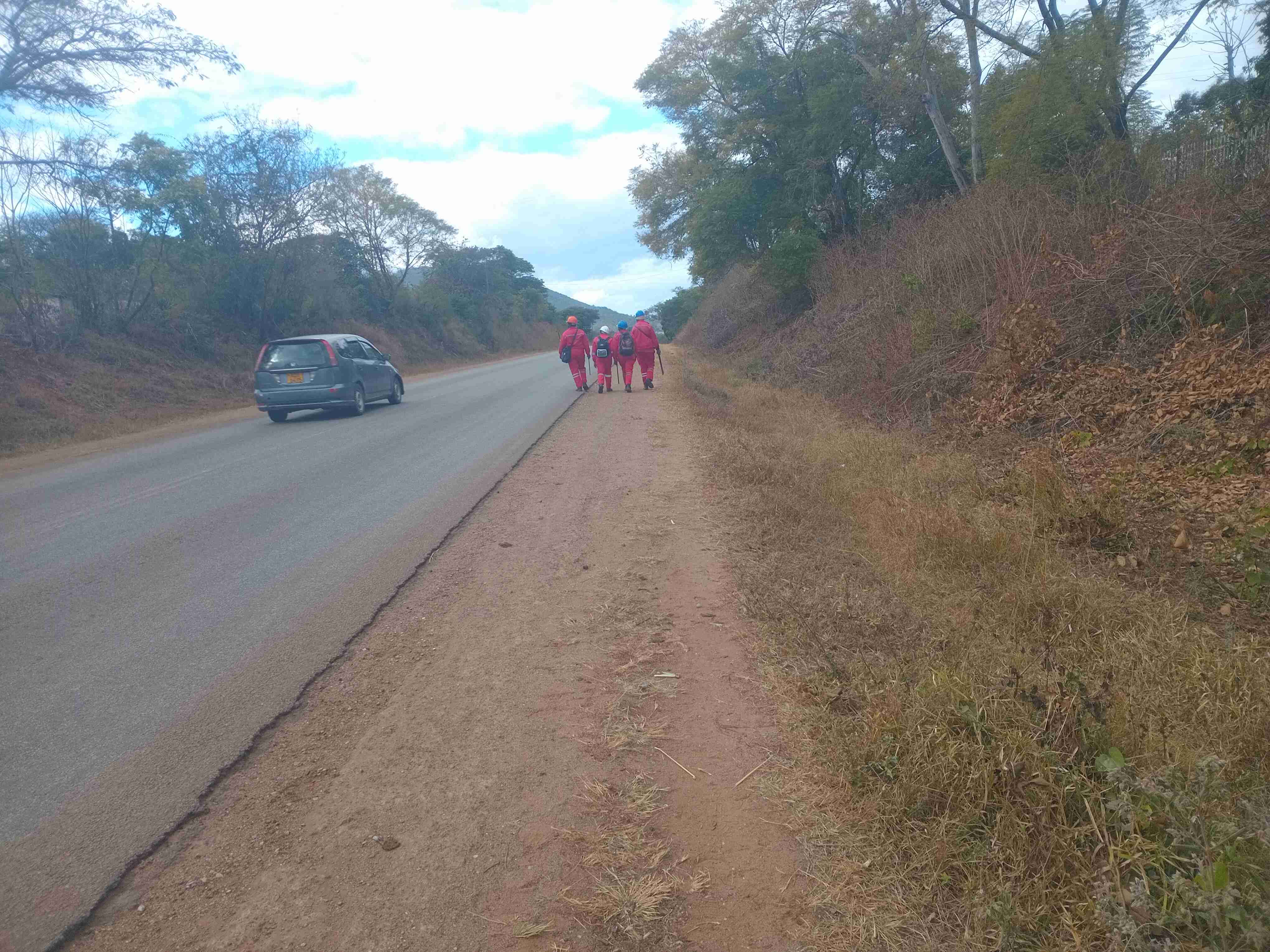 Sino Mine Workers walking along Mutare Road coming from new residential site going to main mine-Photo credit Enos Denhere